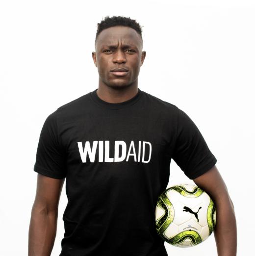 Victor Wanyama in a WildAid t-shirt.